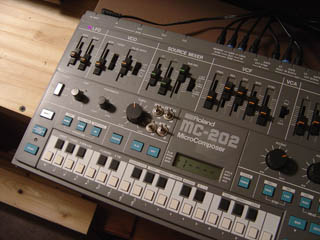 Roland MC-202 (top view) modded with
   10 extra cv/gate jacks